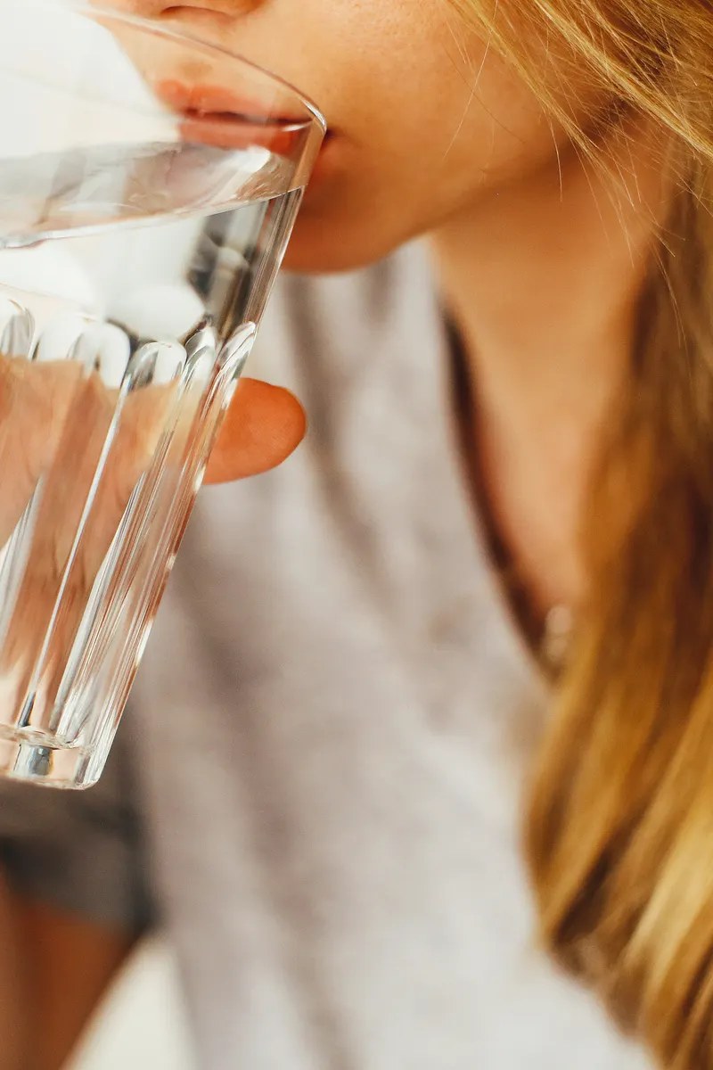 Woman drinking a glass of water