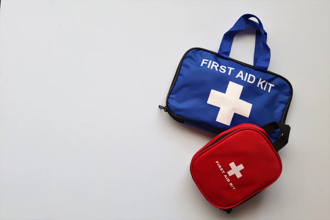 Clean gauze and first aid supplies for stopping bleeding from a bitten tongue or cheek