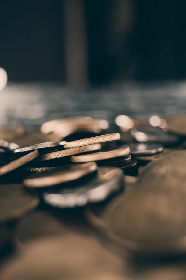 Close-up of coins — a common small object that young children swallow. Photo: Pexels